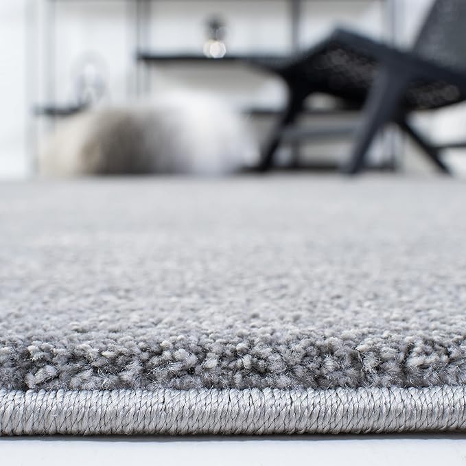 SAFAVIEH Plain and Solid Collection Accent Rug - 4'5" x 6'5", Grey, Non-Shedding & Easy Care, Ideal for High Traffic Areas in Entryway, Living Room, Bedroom (PNS320-4410)