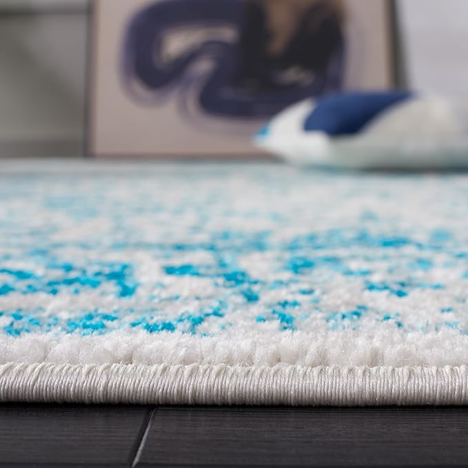 SAFAVIEH Area Rug 8x10 - Adirondack Collection - Large - Ivory & Teal, Distressed Vintage Floral Design, Non-Shedding & Easy to Clean, Ideal for Living Room, Bedroom, Dining Space (ADR109D)