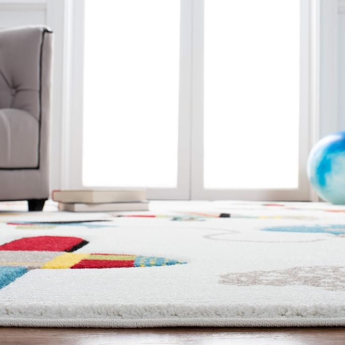 SAFAVIEH Carousel Kids Collection Area Rug - 5'3" x 7'6", Ivory & Blue, Non-Shedding & Easy Care, Ideal for High Traffic Areas for Boys & Girls in Playroom, Nursery, Bedroom (CRK167A)