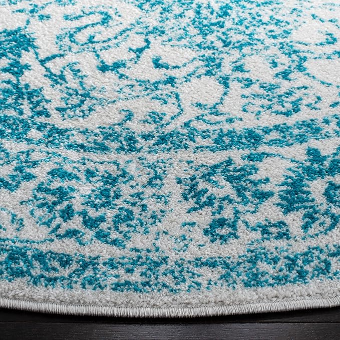 SAFAVIEH Adirondack Collection Area Rug - 4' Round, Ivory & Teal, Distressed Vintage Floral Design, Non-Shedding & Easy to Clean, Ideal for Living Room, Bedroom, Dining Space (ADR109D)