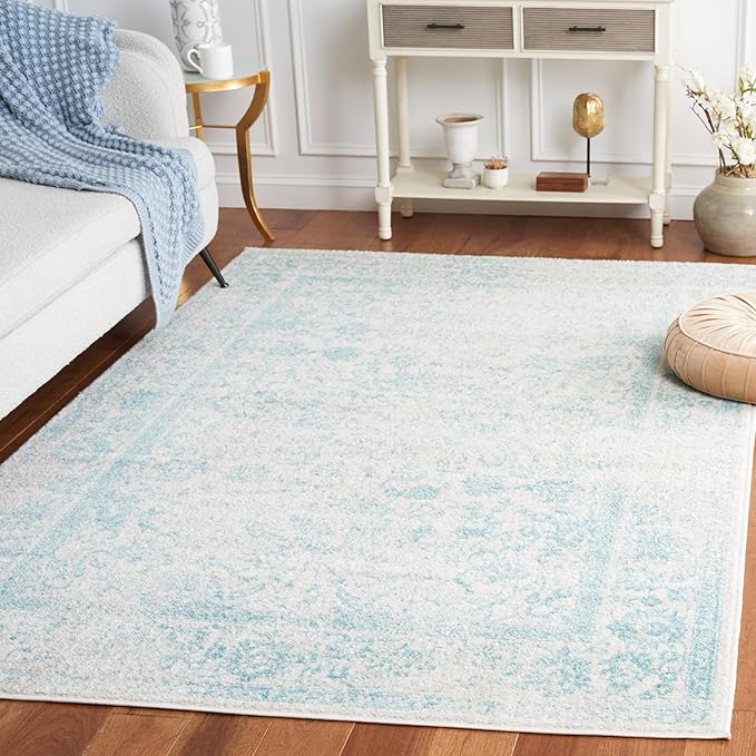 SAFAVIEH Adirondack Collection Area Rug - 5'1" x 7'6", Ivory & Light Blue, Distressed Vintage Floral Design, Non-Shedding & Easy to Clean, Ideal for Living Room, Bedroom, Dining Space (ADR109L)