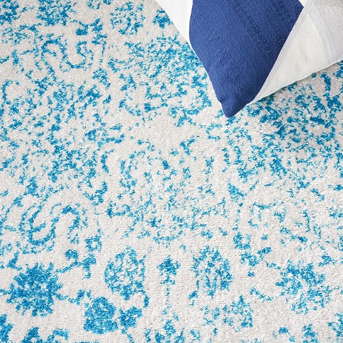 SAFAVIEH Adirondack Collection Area Rug - 5'1" x 7'6", Ivory & Teal, Distressed Vintage Floral Design, Non-Shedding & Easy to Clean, Ideal for Living Room, Bedroom, Dining Space (ADR109D)