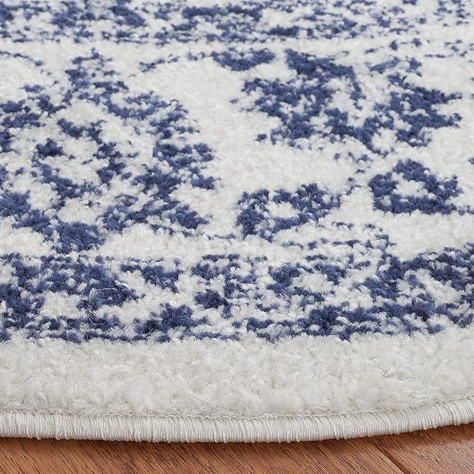 SAFAVIEH Adirondack Collection Area Rug - 6' Round, Ivory & Navy, Distressed Vintage Floral Design, Non-Shedding & Easy to Clean, Ideal for Living Room, Bedroom, Dining Space (ADR109M)