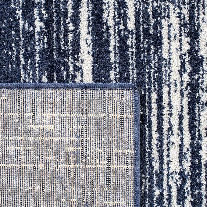 SAFAVIEH Adirondack Collection Area Rug - 5'5" x 7'7", Navy & Ivory, Modern Ombre Design, Non Shedding & Easy to Clean, Ideal for Living Room, Bedroom, Office, Dining Space (ADR113N)