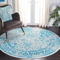 SAFAVIEH Adirondack Collection Area Rug - 4' Round, Ivory & Teal, Distressed Vintage Floral Design, Non-Shedding & Easy to Clean, Ideal for Living Room, Bedroom, Dining Space (ADR109D)