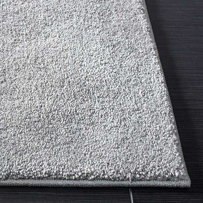 SAFAVIEH Plain and Solid Collection Area Rug - 6'7" x 9', Light Grey, Non-Shedding & Easy Care, Ideal for High Traffic Areas in Living Room, Bedroom (PNS320-4424)