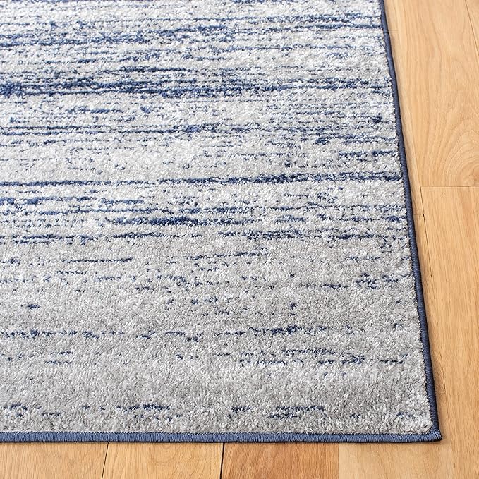 SAFAVIEH Adirondack Collection Area Rug - 10' Square, Navy & Grey, Modern Ombre Design, Non Shedding & Easy to Clean, Ideal for Living Room, Bedroom, Office, Dining Space (ADR113E)