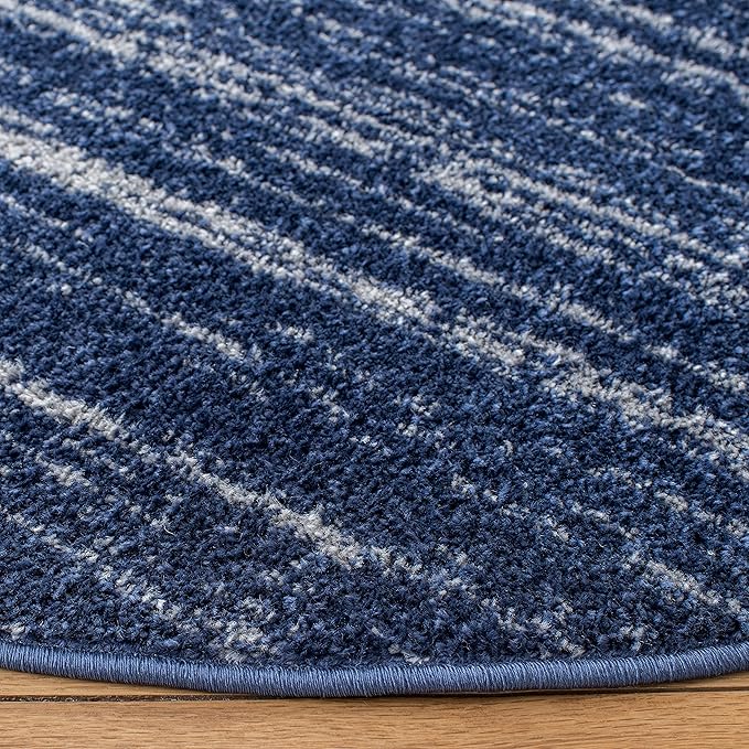 Safavieh Adirondack Collection Area Rug - 10' Round, Navy & Ivory, Modern Ombre Design, Non Shedding & Easy to Clean, Ideal for Living Room, Bedroom, Office, Dining Space (ADR113N)