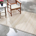 Fab Habitat Outdoor Rug - Waterproof, Fade Resistant, Crease-Free - Premium Recycled Plastic - Neutral Striped - Patio, Porch, Deck, Balcony - Cancun Shadow - Sand & Black - 5 x 8 ft