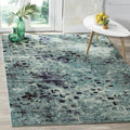 SAFAVIEH Monaco Collection Area Rug - 5'1" x 7'7", Light Blue & Multi, Boho Chic Abstract Watercolor Design, Non-Shedding & Easy Care, Ideal for High Traffic Areas in Living Room, Bedroom (MNC225J)